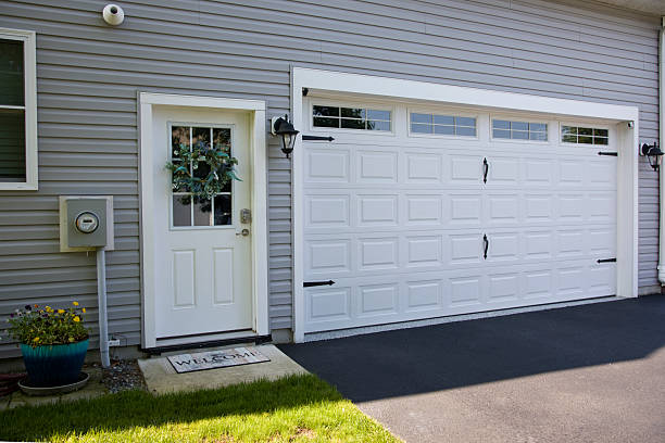 24/7 Emergency Garage Door Panel Replacement experts in Jal, NM